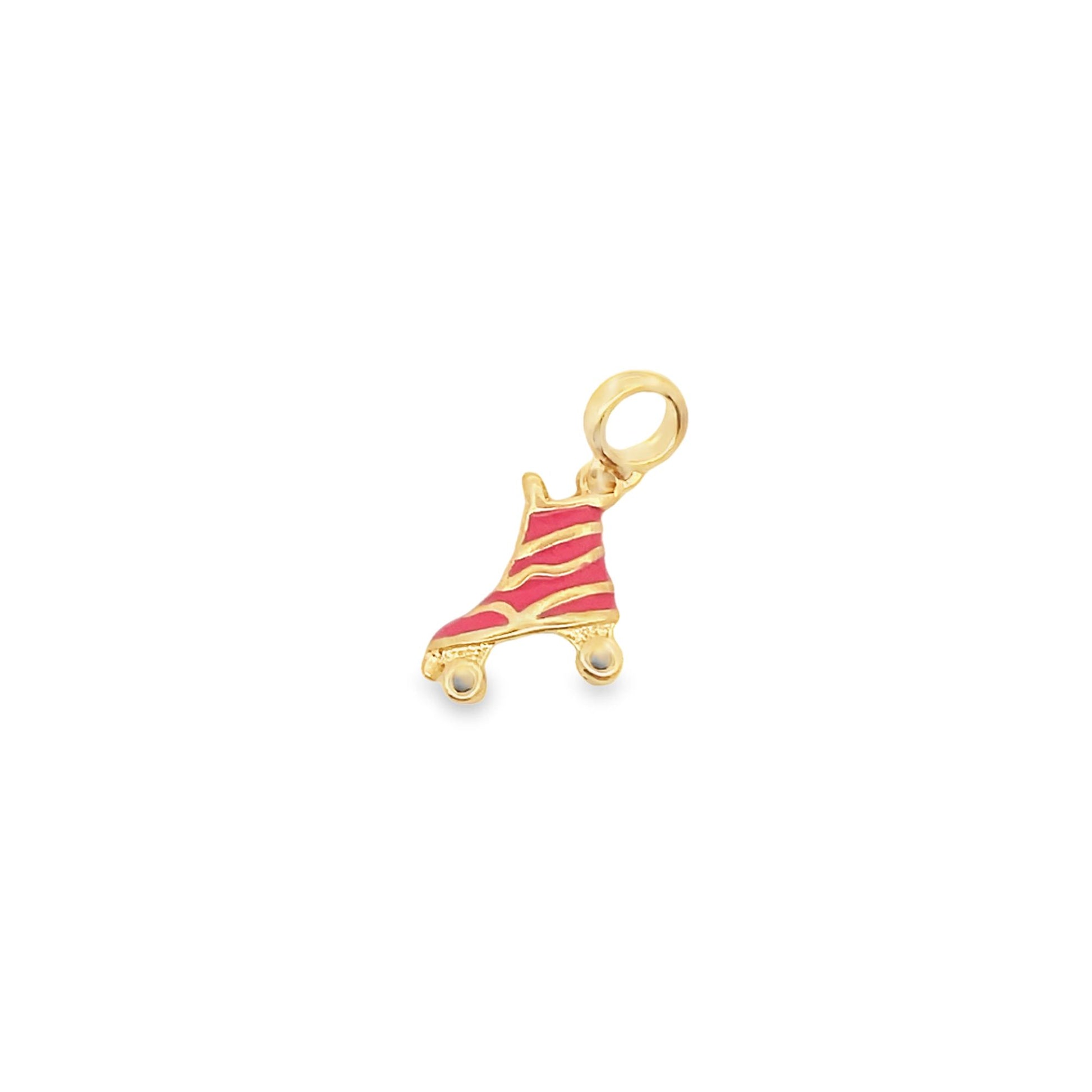 A gold roller skate charm features pink enamel detailing and gold wheels against a clean white background.