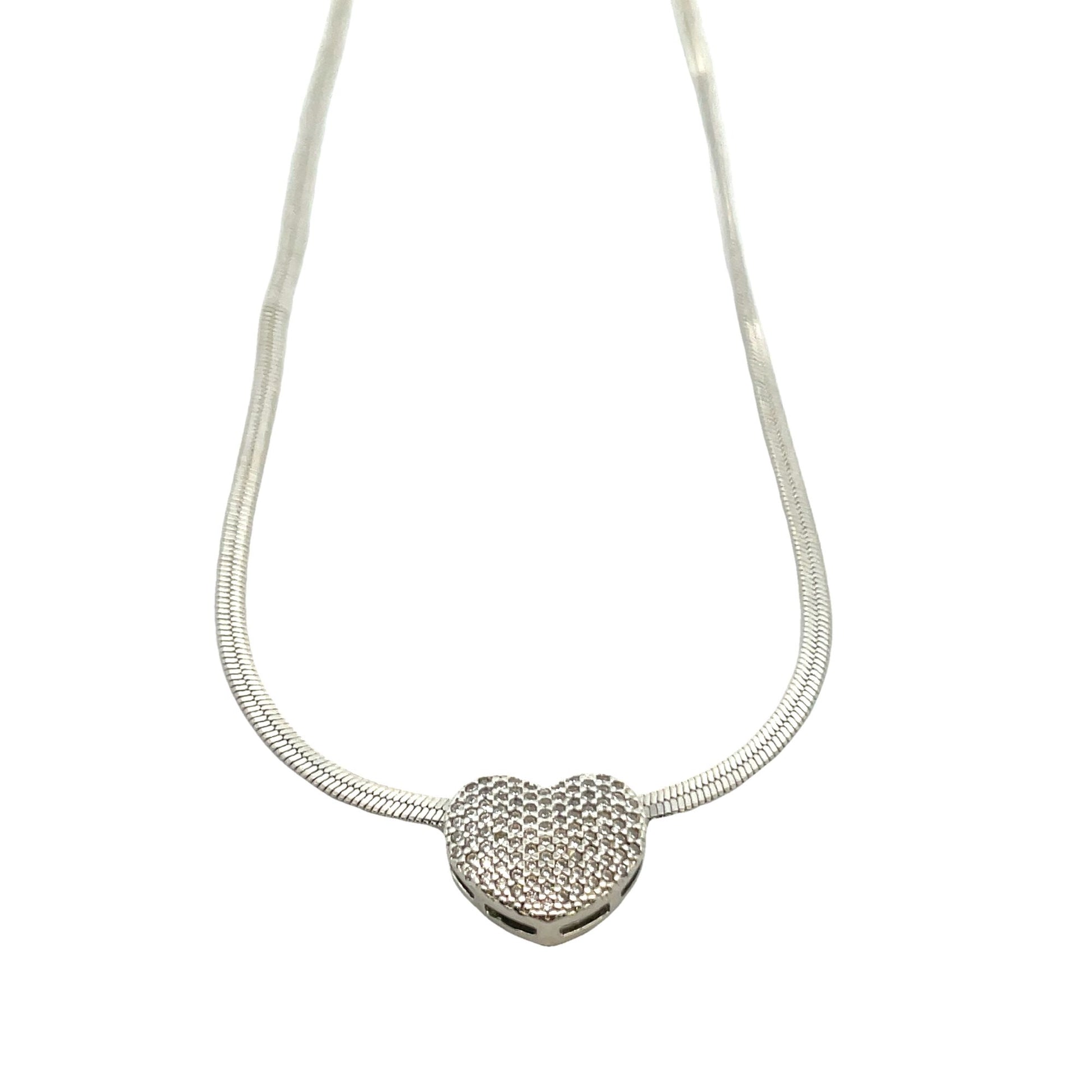 A sparkling, pavé-set diamond heart pendant dangles delicately from a sleek silver snake chain necklace.