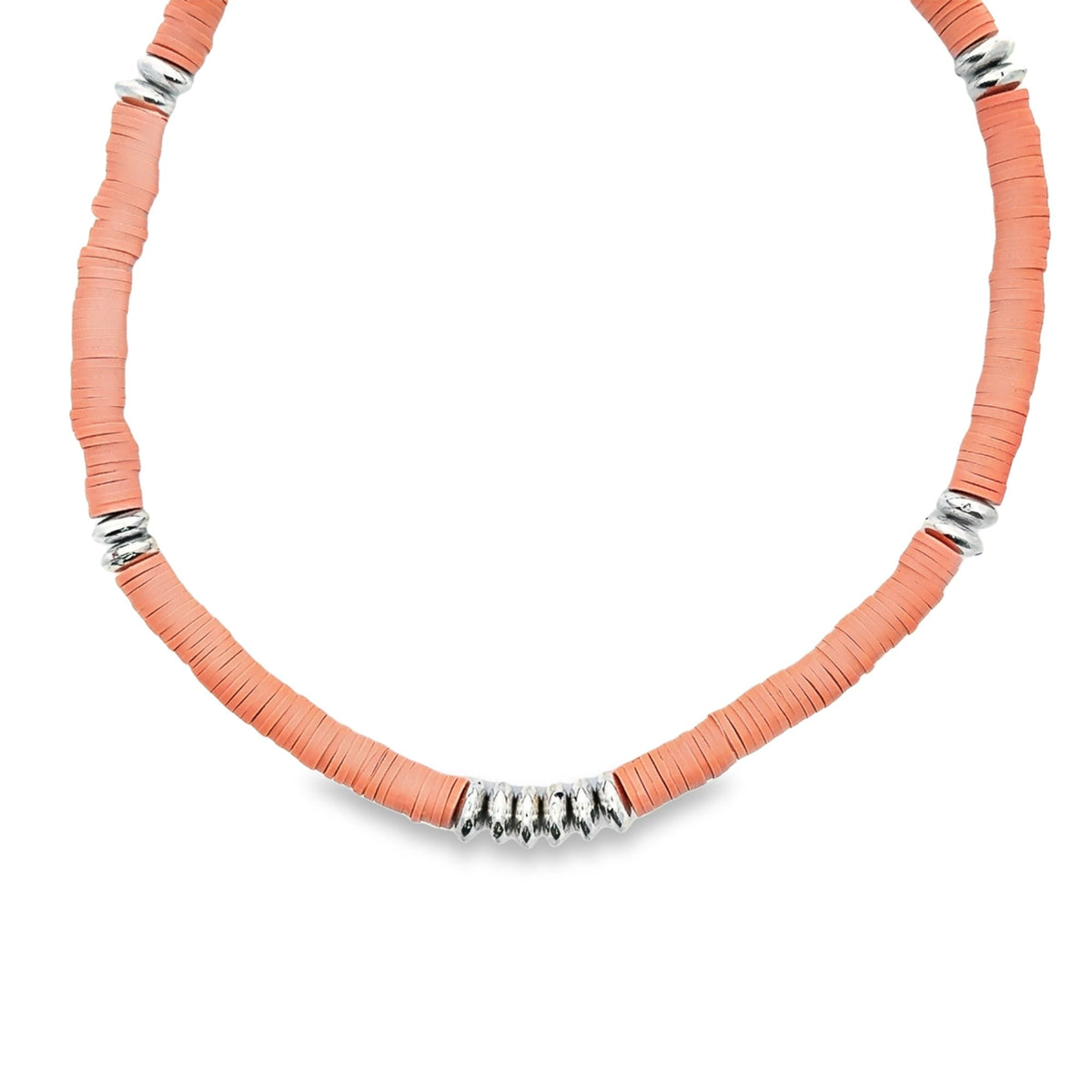 A coral pink heishi bead choker necklace features interspersed metallic silver spacer beads against a clean white background.