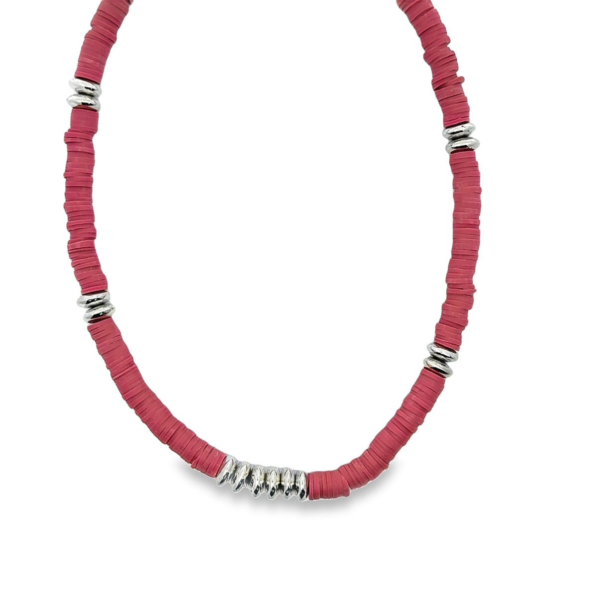 A vibrant pink heishi bead necklace features interspersed silver spacer beads against a white background.