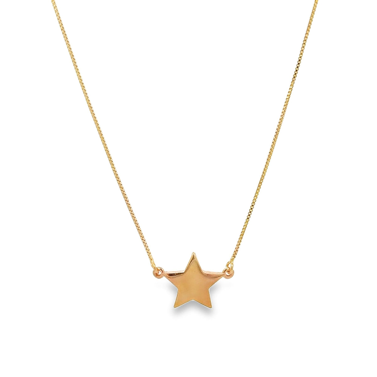 A delicate gold star pendant hangs gracefully from a matching chain necklace against a white background.