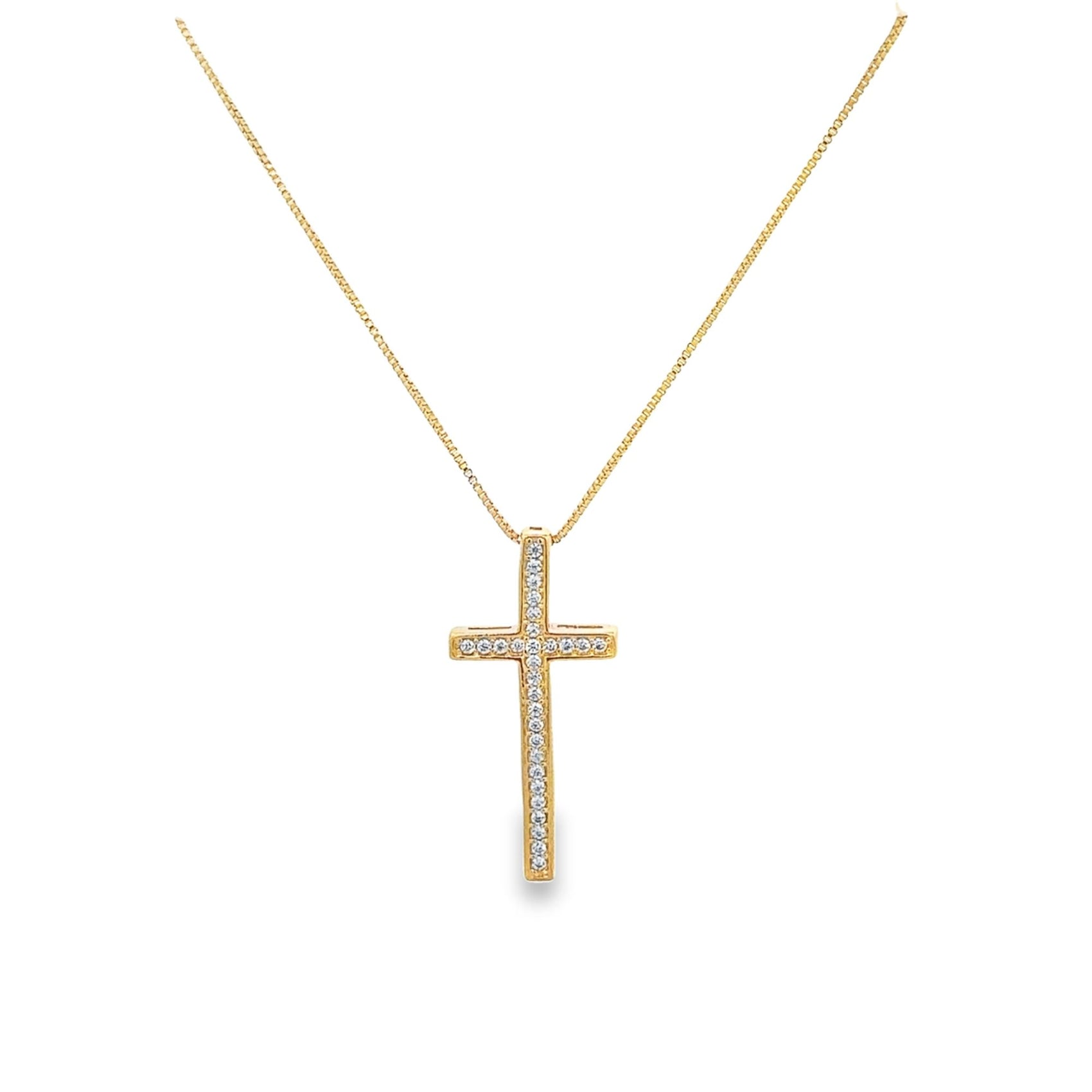 A delicate gold cross pendant encrusted with sparkling diamonds hangs gracefully from a matching gold chain.
