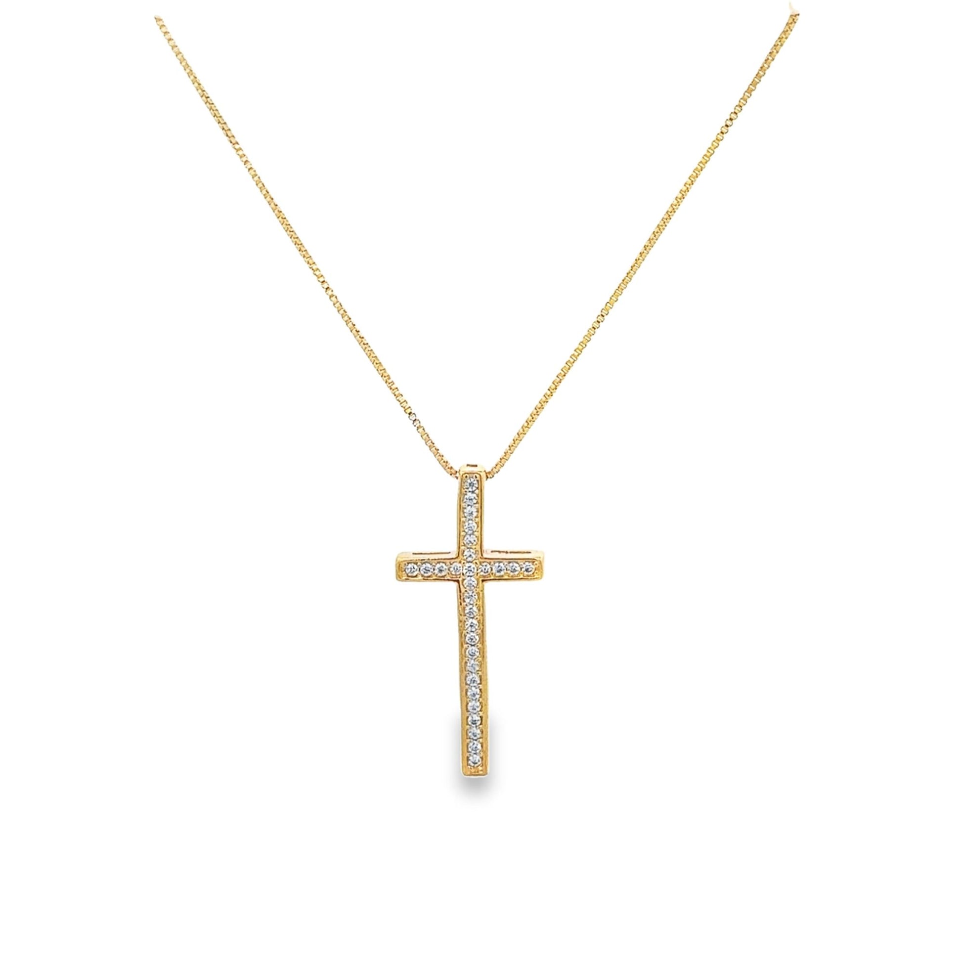 A delicate gold cross pendant encrusted with sparkling diamonds hangs gracefully from a matching gold chain.