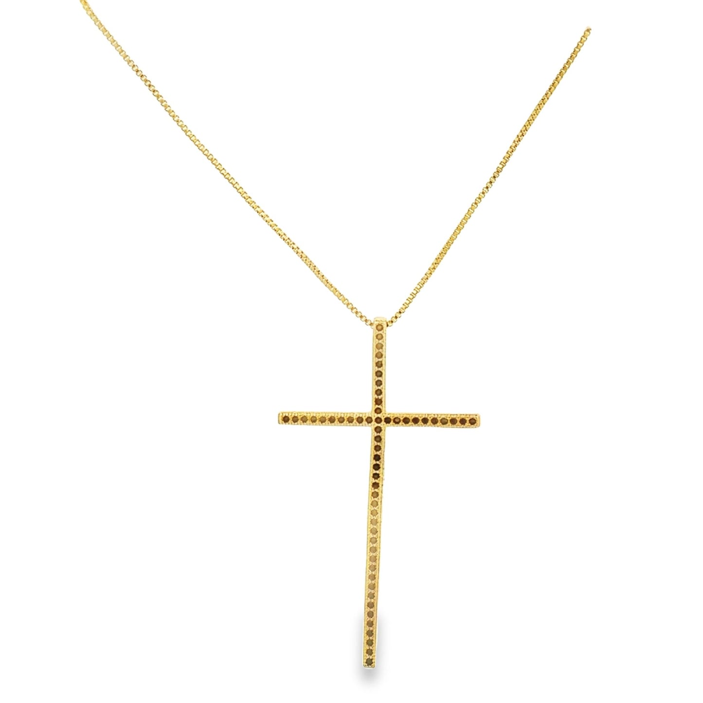 A delicate gold cross pendant encrusted with small black diamonds hangs from a matching box chain.