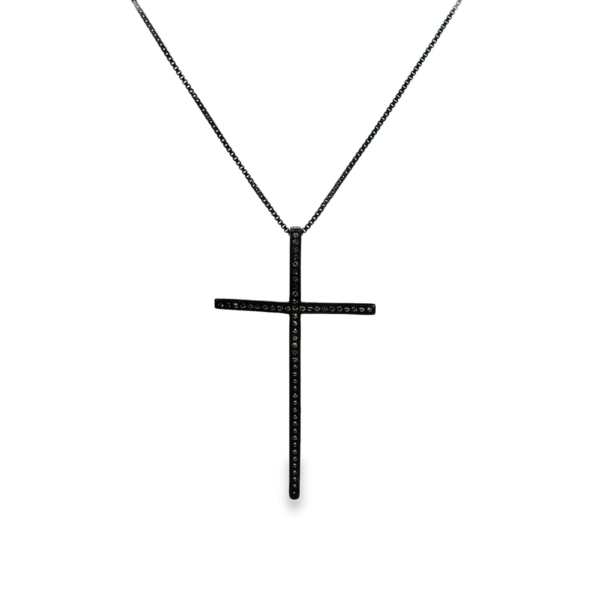 A black pavé diamond cross pendant hangs gracefully from a delicate matching black chain.