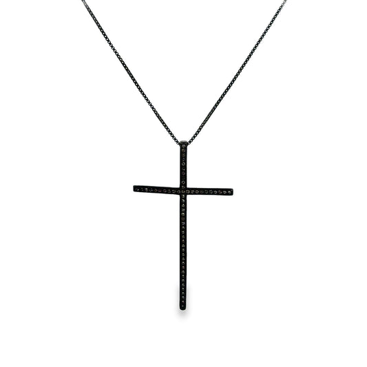 A black pavé diamond cross pendant hangs gracefully from a delicate matching black chain.