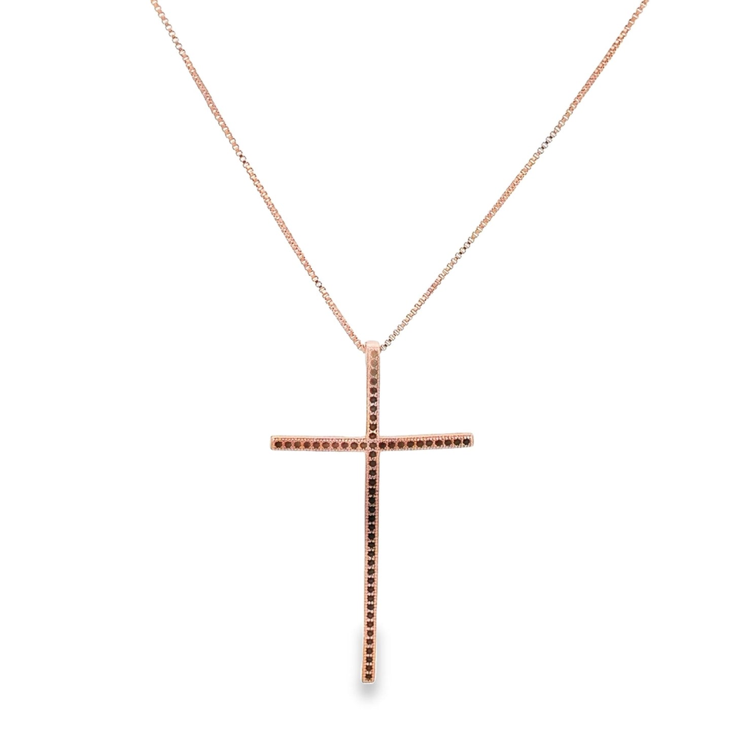 A rose gold cross pendant necklace featuring inlaid black diamonds hangs against a plain white background.