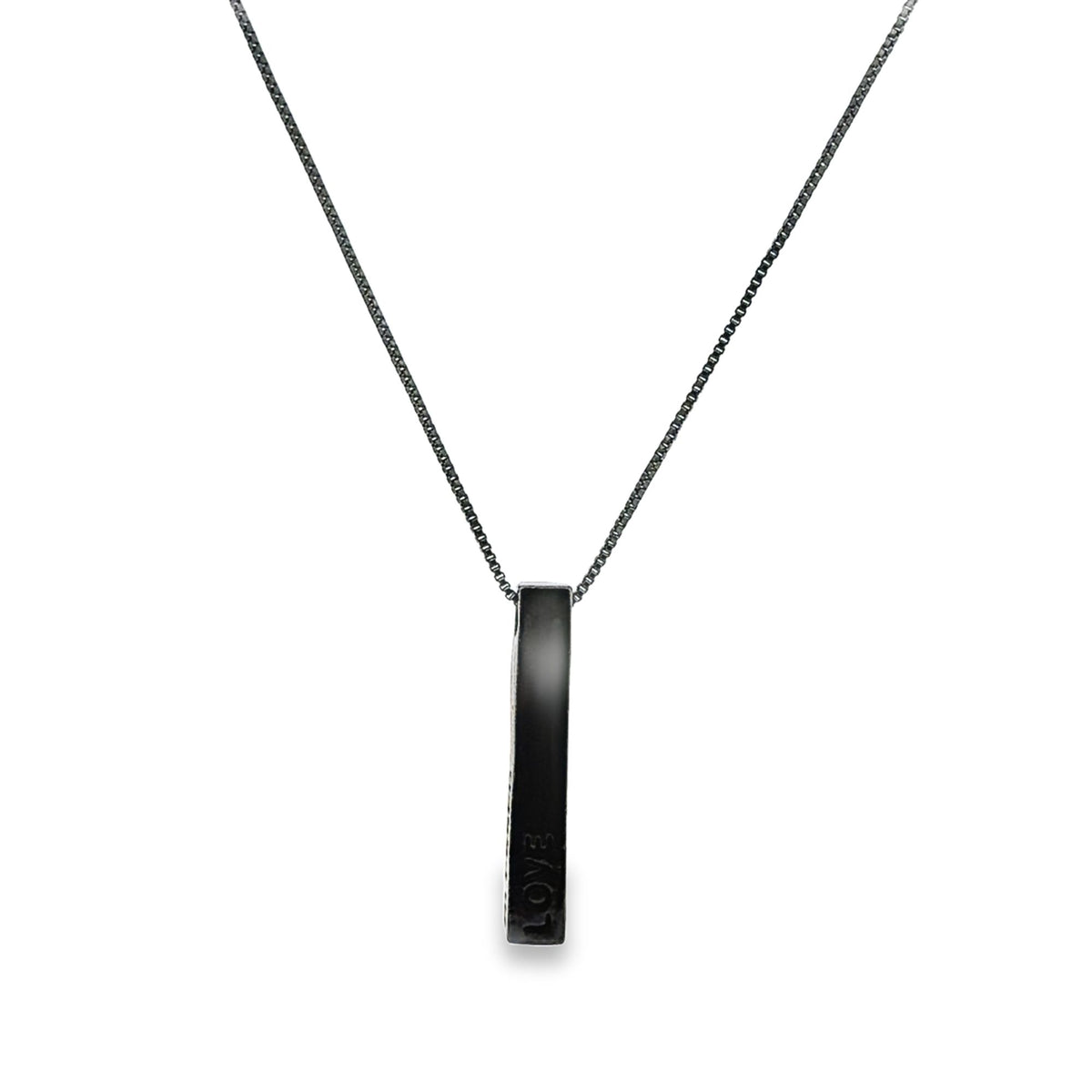 A sleek black bar pendant inscribed with the word "LOVE" hangs delicately from a matching dark chain necklace.