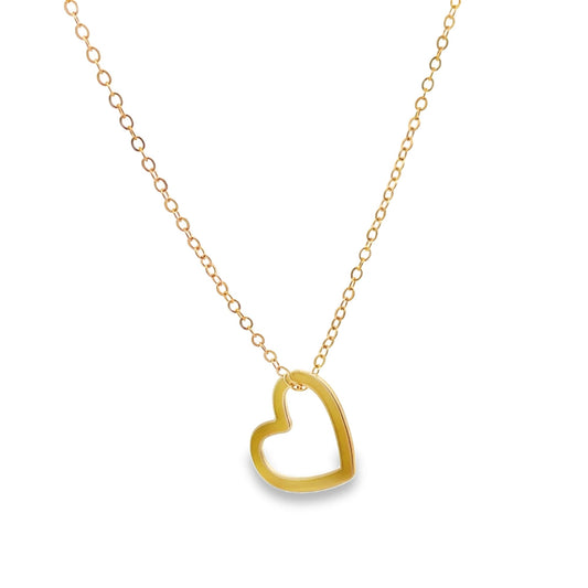 A delicate gold chain necklace dangles with an open-work heart pendant against a white background.