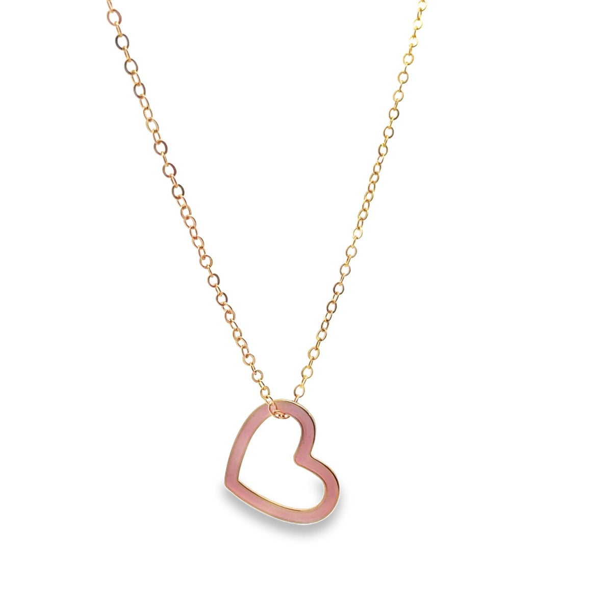 A delicate gold chain necklace hangs against a white background, featuring a glossy pink enamel heart pendant.