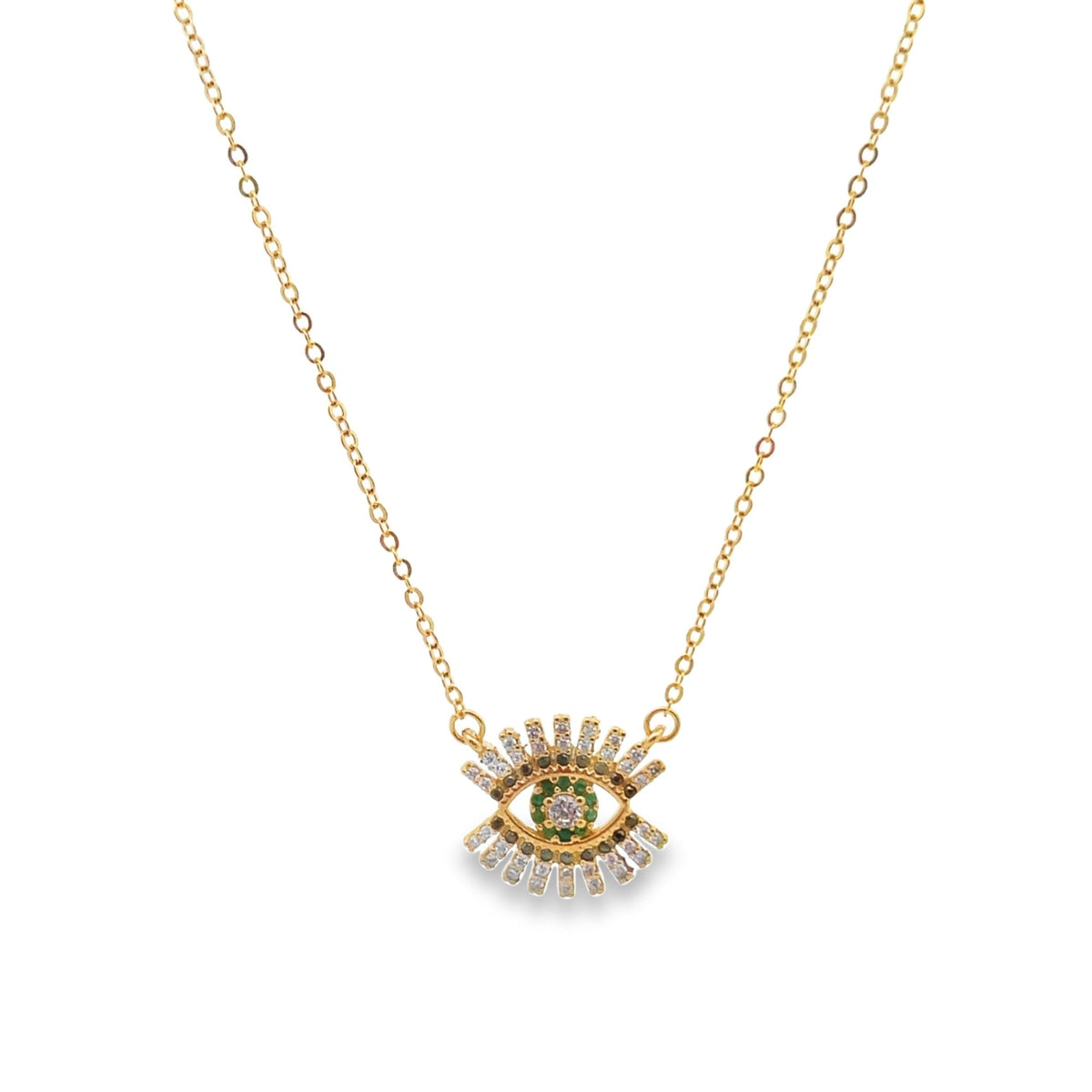 A delicate gold chain necklace features a sparkling evil eye pendant adorned with cubic zirconia crystals and green stones.