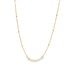 A delicate gold station necklace features evenly spaced metallic beads along a fine chain against a white background.