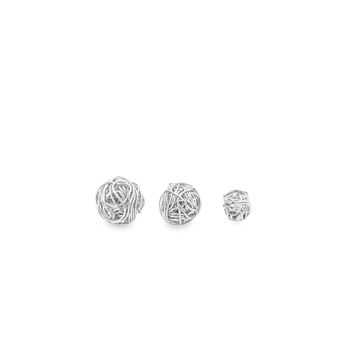Three intricate sterling silver wire ball beads are arranged in a row against a clean white background.