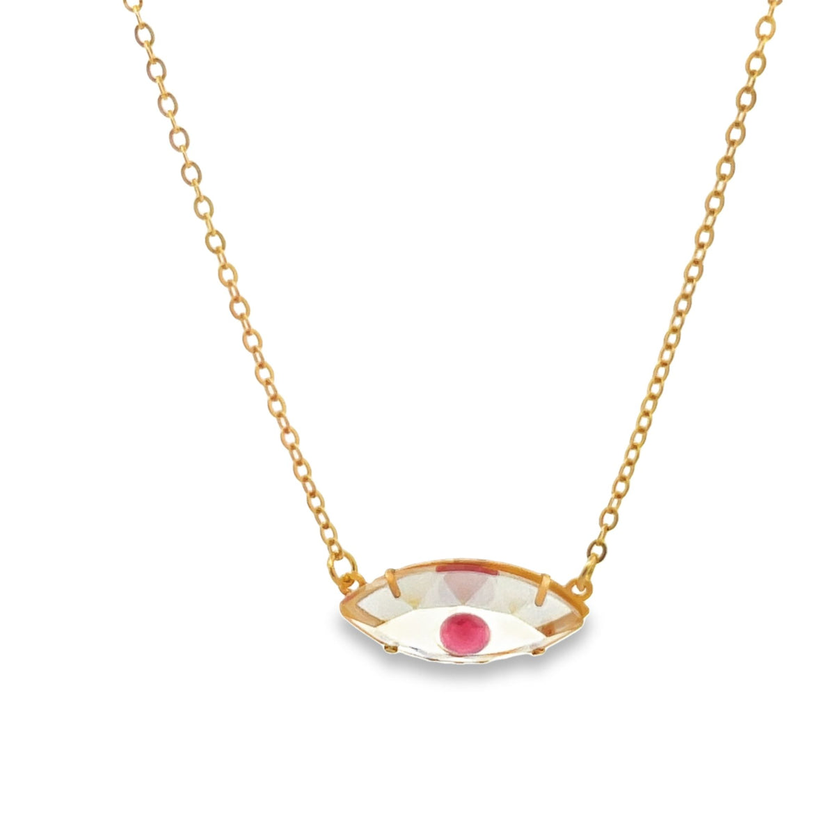 A delicate gold chain necklace features an eye-shaped pendant set with a clear crystal and a vibrant pink center stone.