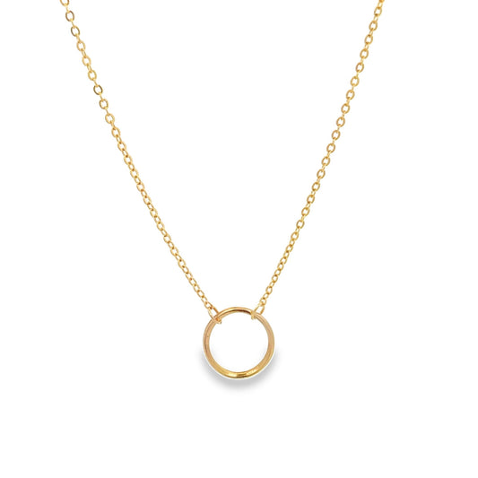 A delicate gold chain necklace features a minimalist round circle pendant.