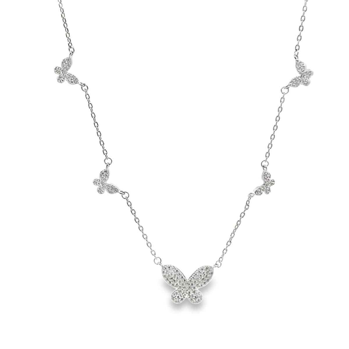 A delicate sterling silver butterfly pendant necklace sparkles with pavé-set diamonds along its chain.