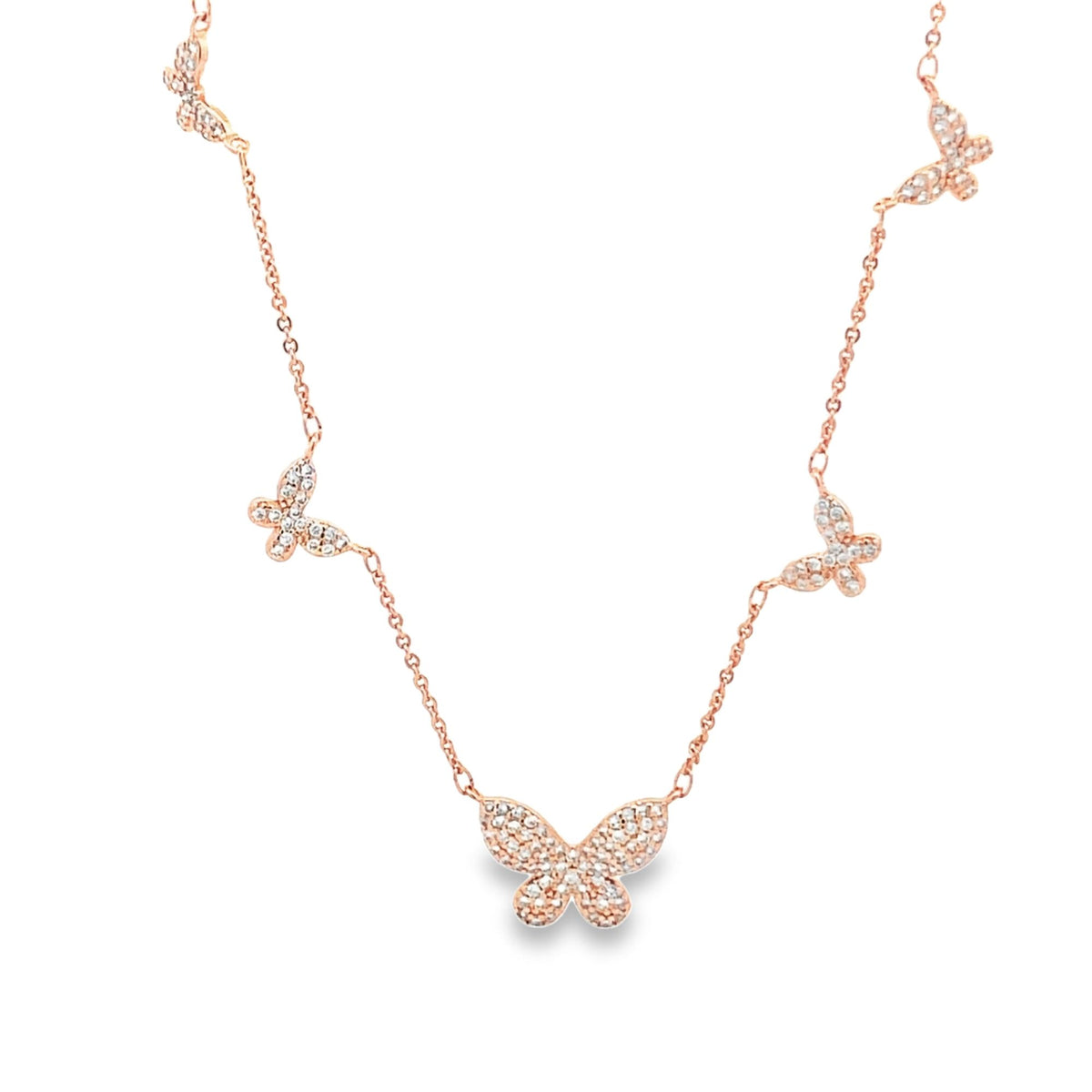 A delicate rose gold butterfly necklace features multiple sparkling pavé-set diamond butterfly charms spaced along the fine chain.