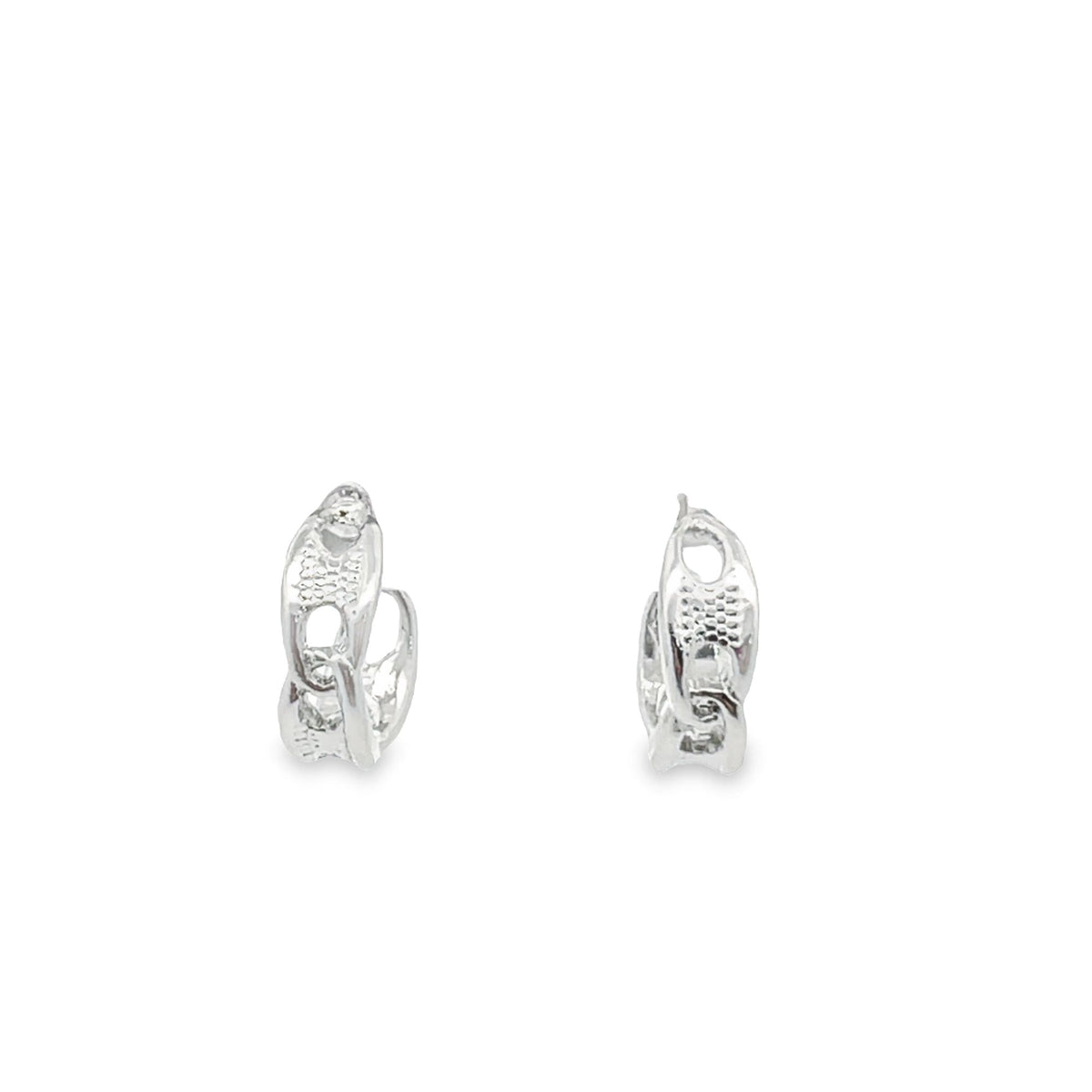 A pair of textured silver hoop earrings rests against a clean white background.
