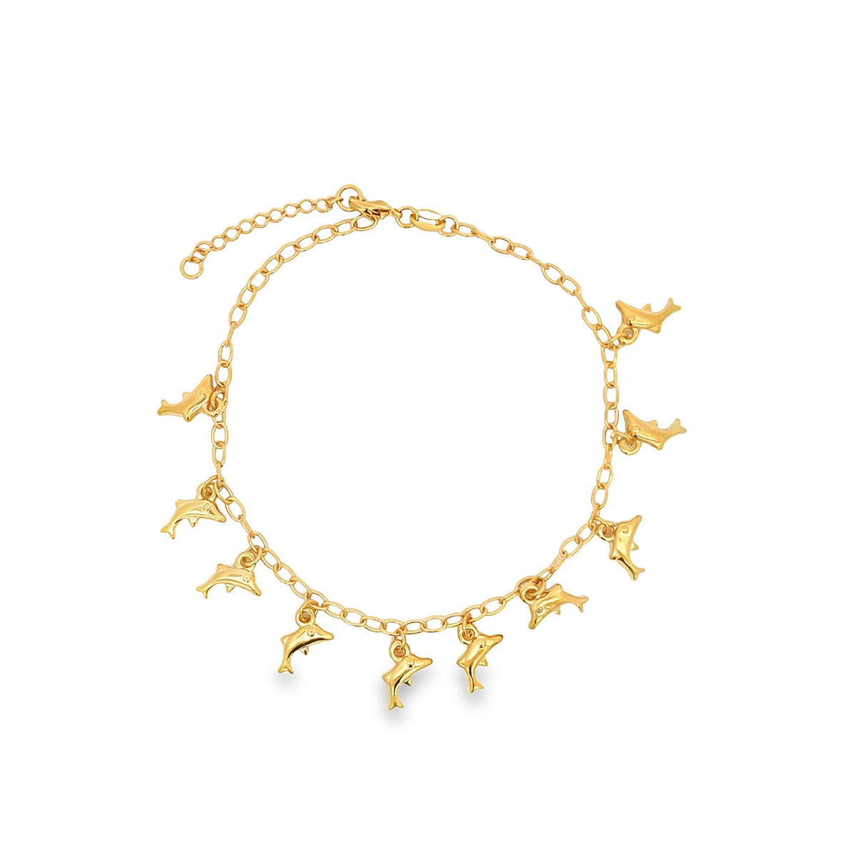 A gold dolphin charm anklet rests on a clean white background.