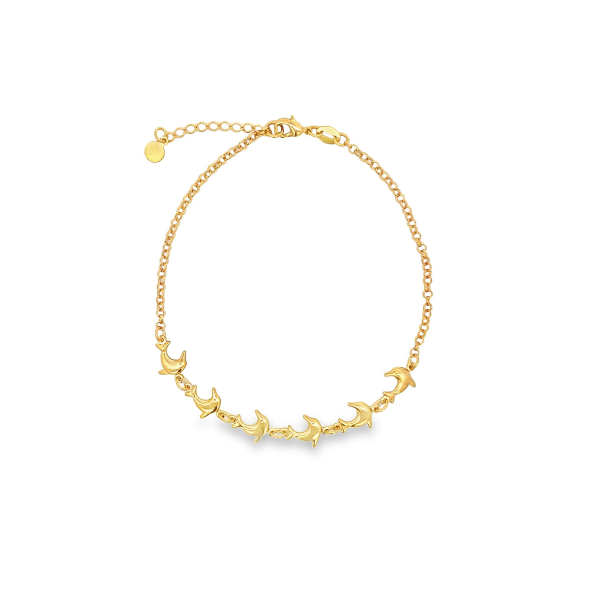 A delicate gold anklet features a charming row of dolphin charms along a link chain against a clean white background.