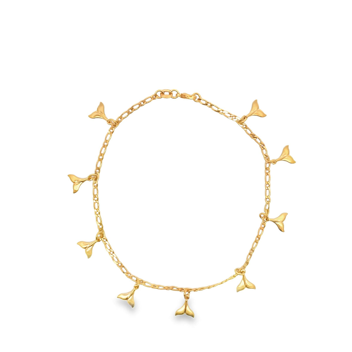 A delicate gold chain necklace displays multiple dangling whale tail charms against a clean white background.