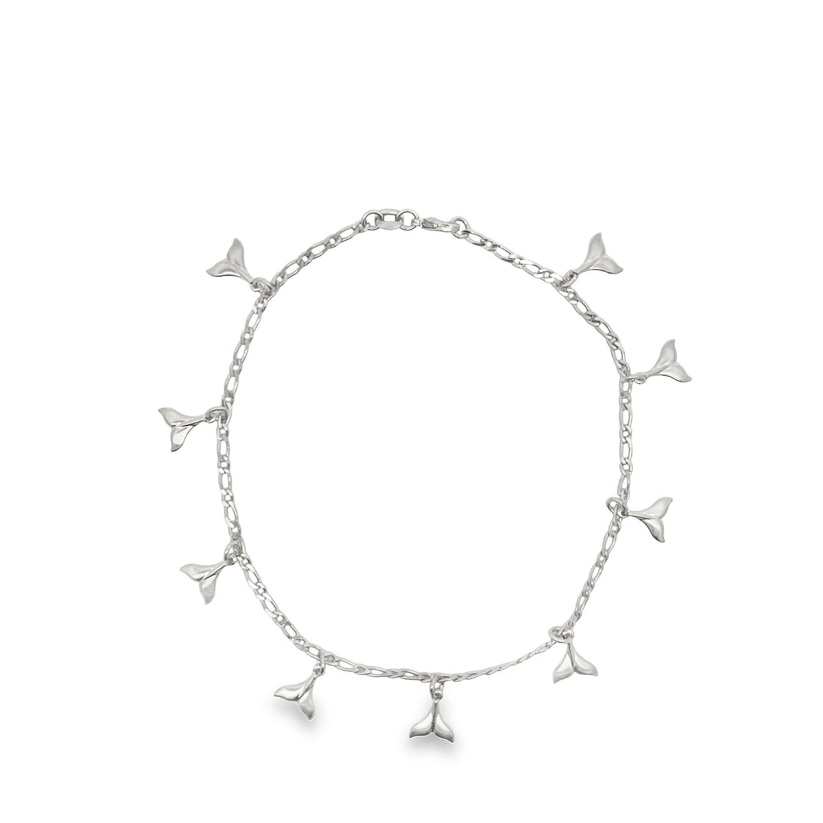 A delicate silver chain anklet showcases multiple dangling whale tail charms against a clean white background.