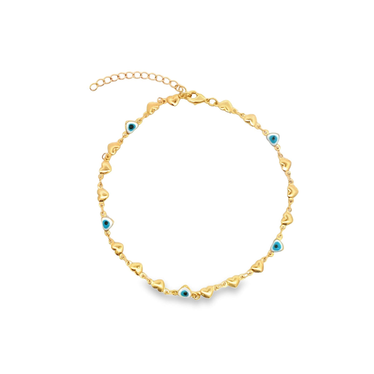 A gold anklet features alternating heart charms and blue evil eye beads against a white background.