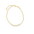 A delicate gold chain necklace with an intricate interlocking link pattern rests on a white background.