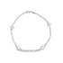 A delicate sterling silver charm bracelet features dangling oceanic charms including a turtle, seahorse, and starfish.