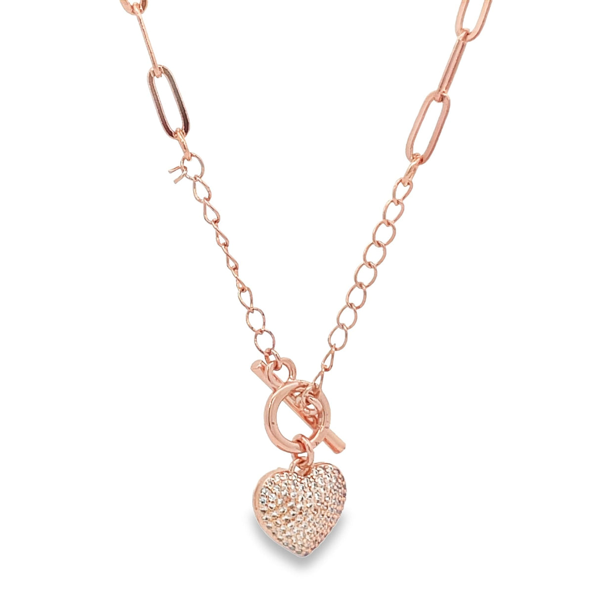 A rose gold chain necklace features a sparkling pavé diamond heart pendant suspended from a toggle clasp.