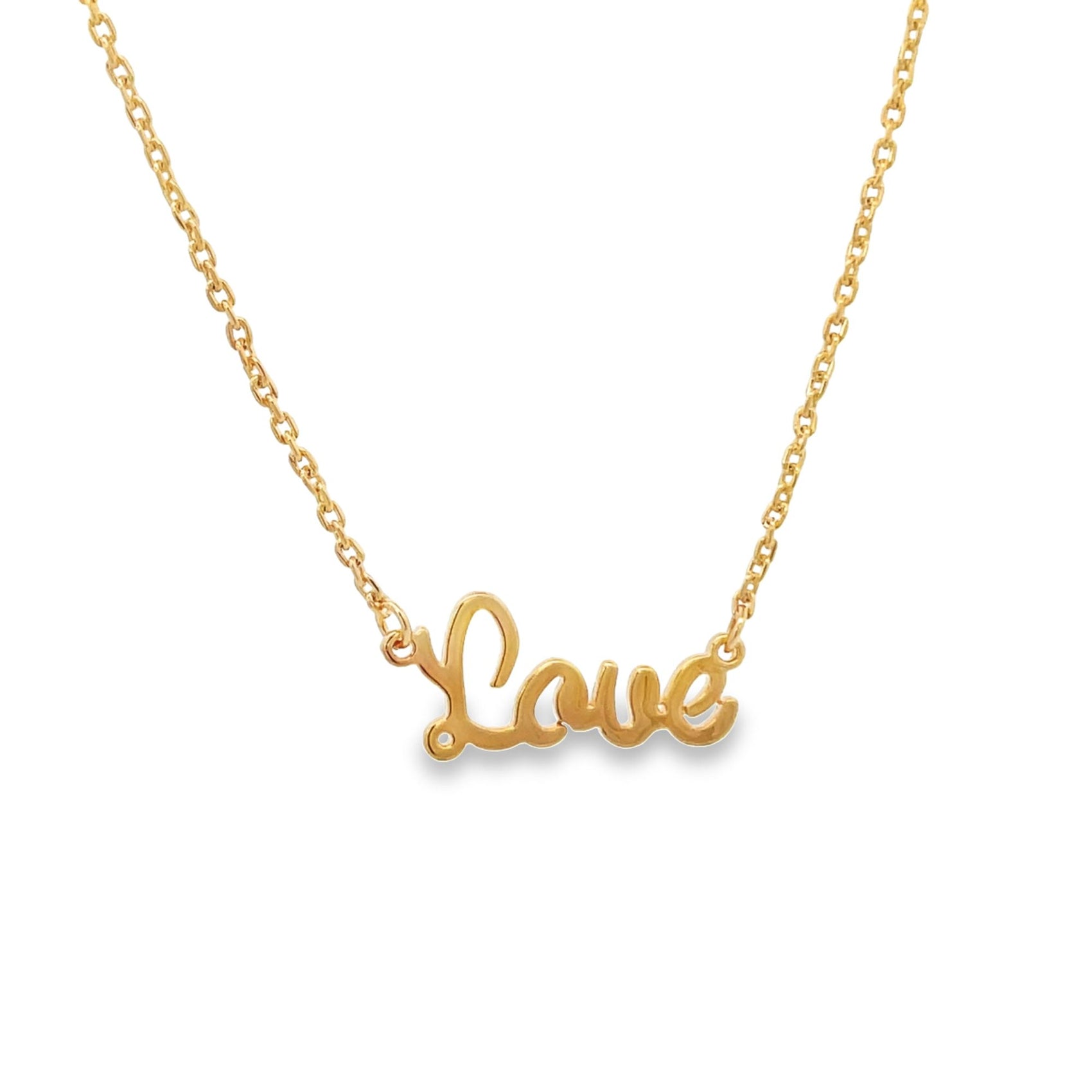 A delicate gold chain necklace displays a cursive pendant that reads "Love" against a plain white background.