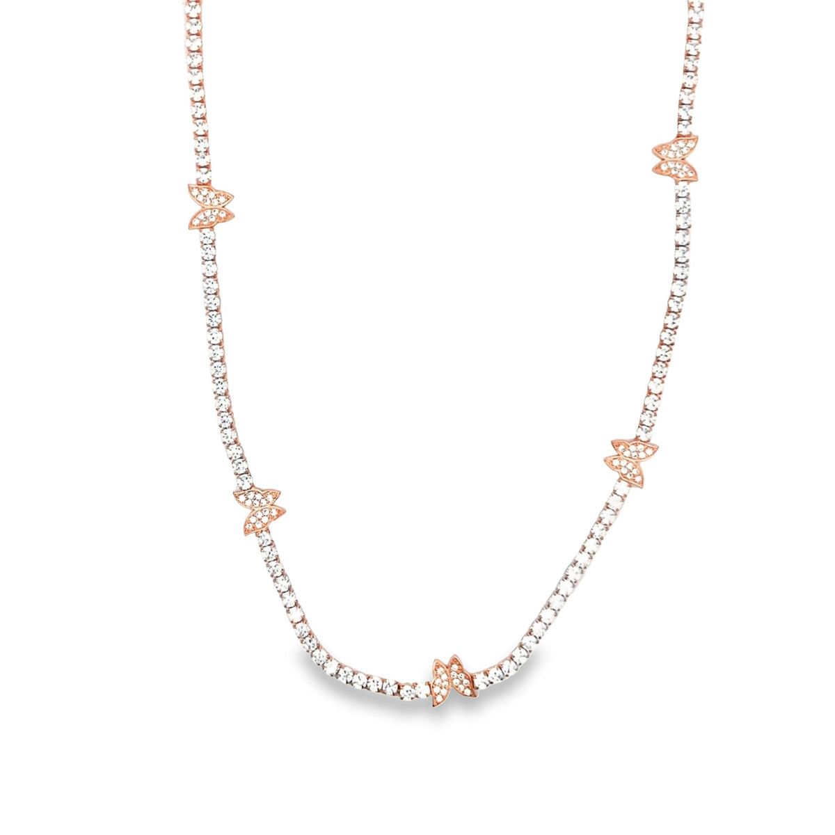 A rose gold tennis necklace features sparkling pave-set diamonds and delicate butterfly charms spaced along the chain against a clean white background.