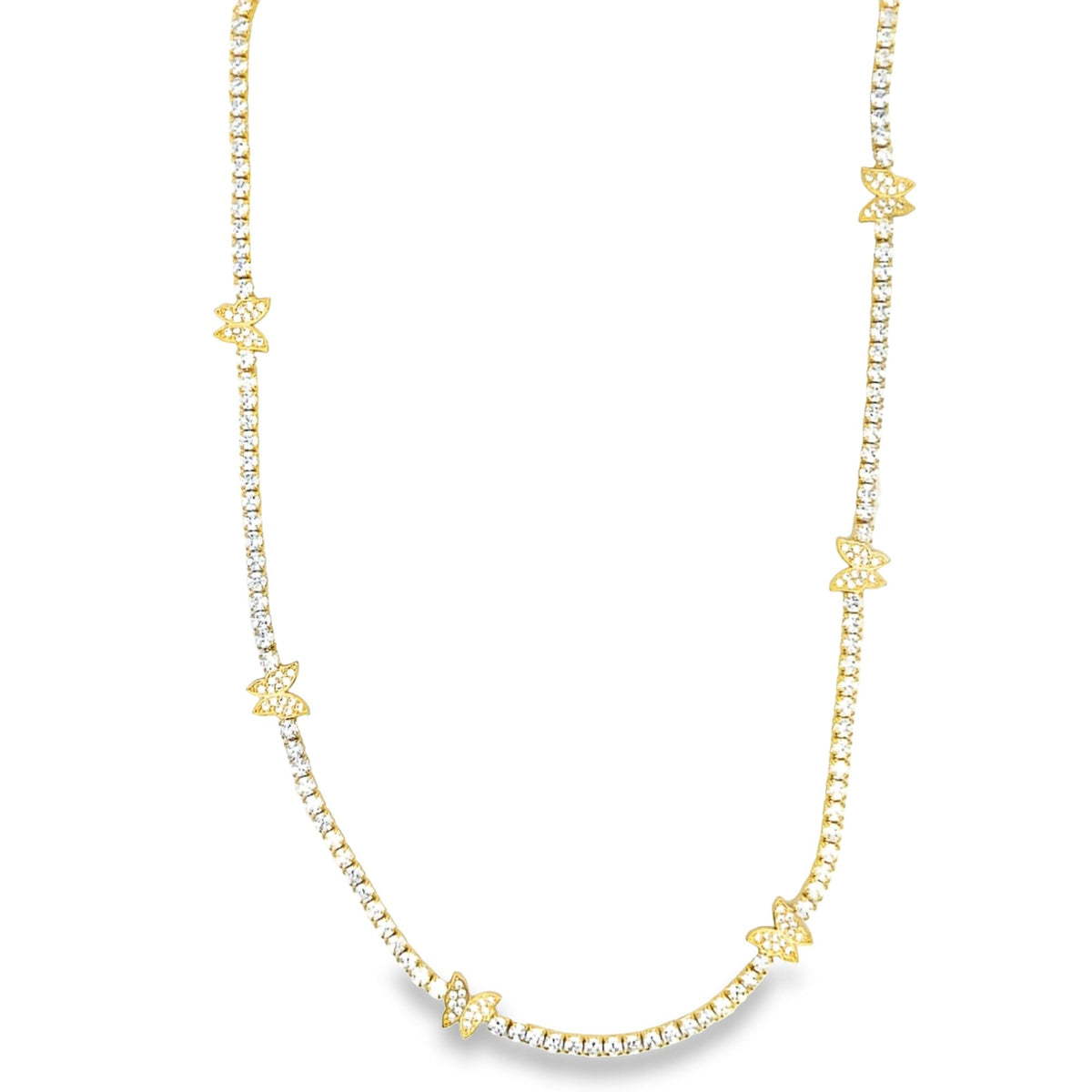 A sparkling gold tennis necklace features delicate diamond-encrusted butterfly charms spaced along the chain.