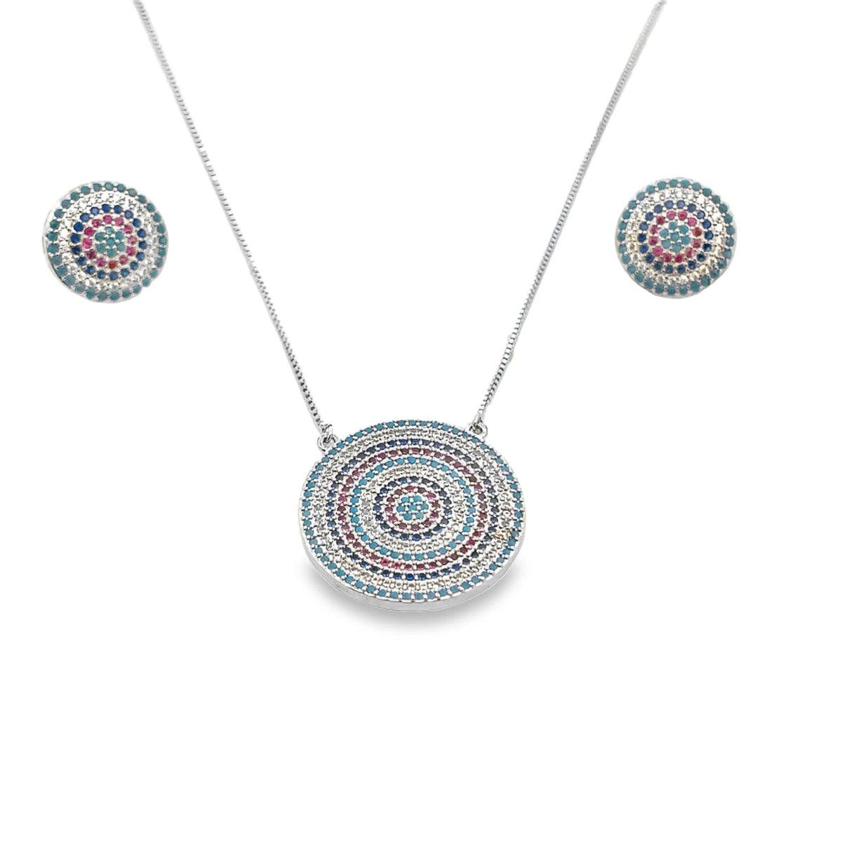 A sterling silver jewelry set features a matching circular pendant necklace and stud earrings embellished with concentric rings of colorful cubic zirconia stones.