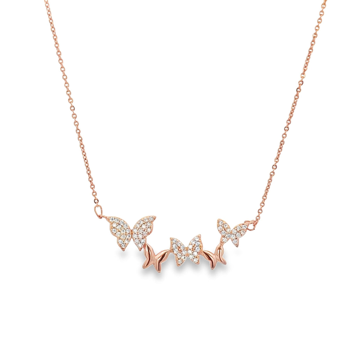 A delicate rose gold butterfly pendant necklace sparkles with pavé diamonds against a white background.