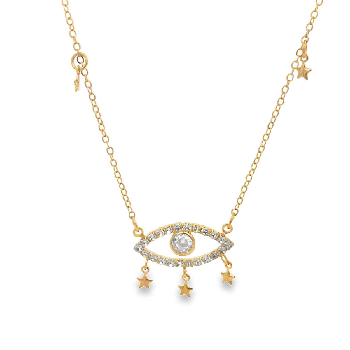 A delicate gold evil eye necklace features sparkling cubic zirconia crystals and dangling star charms against a clean white background.