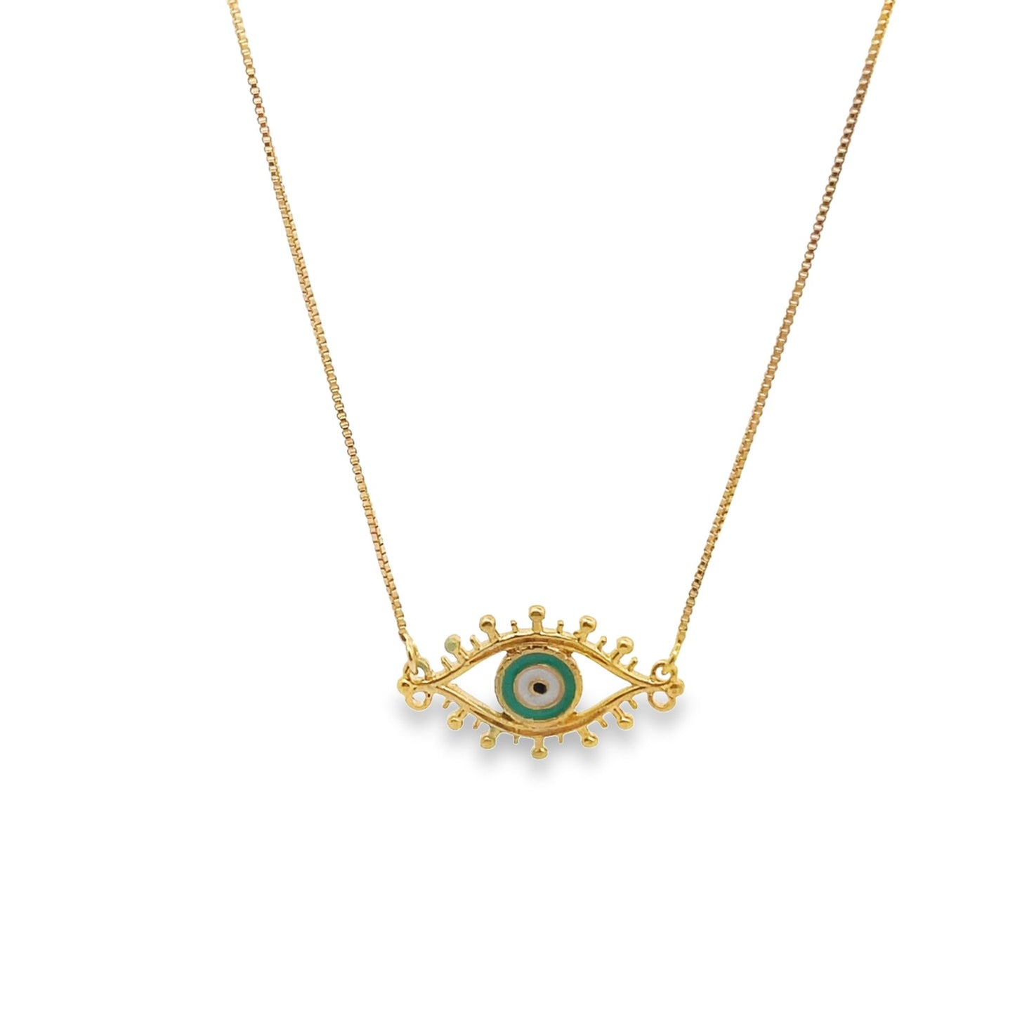 A delicate gold chain holds an intricate evil eye pendant featuring teal and white enamel details.