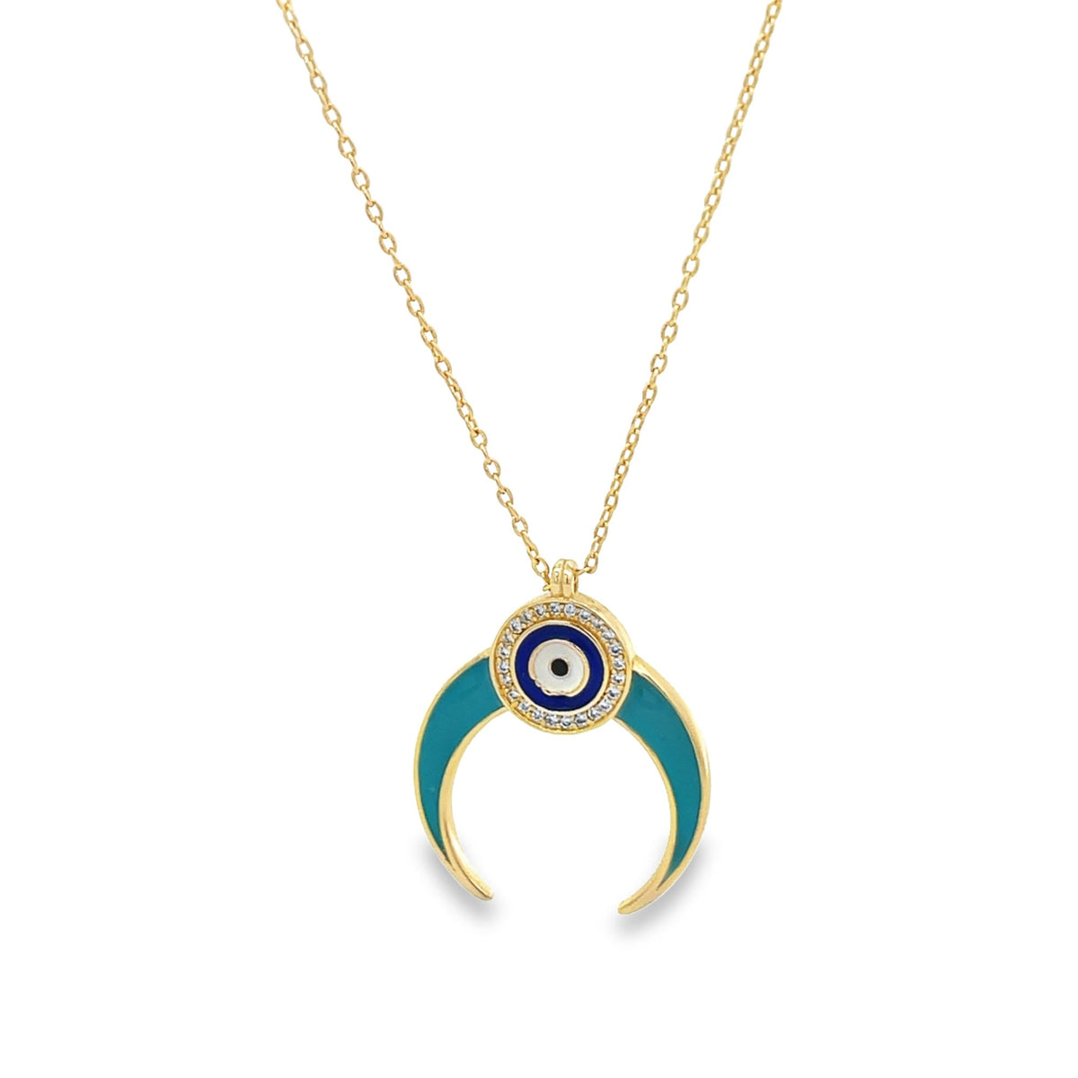 A delicate gold chain holds a crescent moon pendant featuring blue enamel and a sparkling evil eye center.