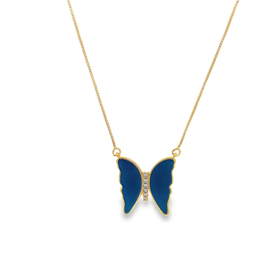 A delicate gold chain holds a vibrant blue enamel butterfly pendant accented with sparkling cubic zirconia stones.