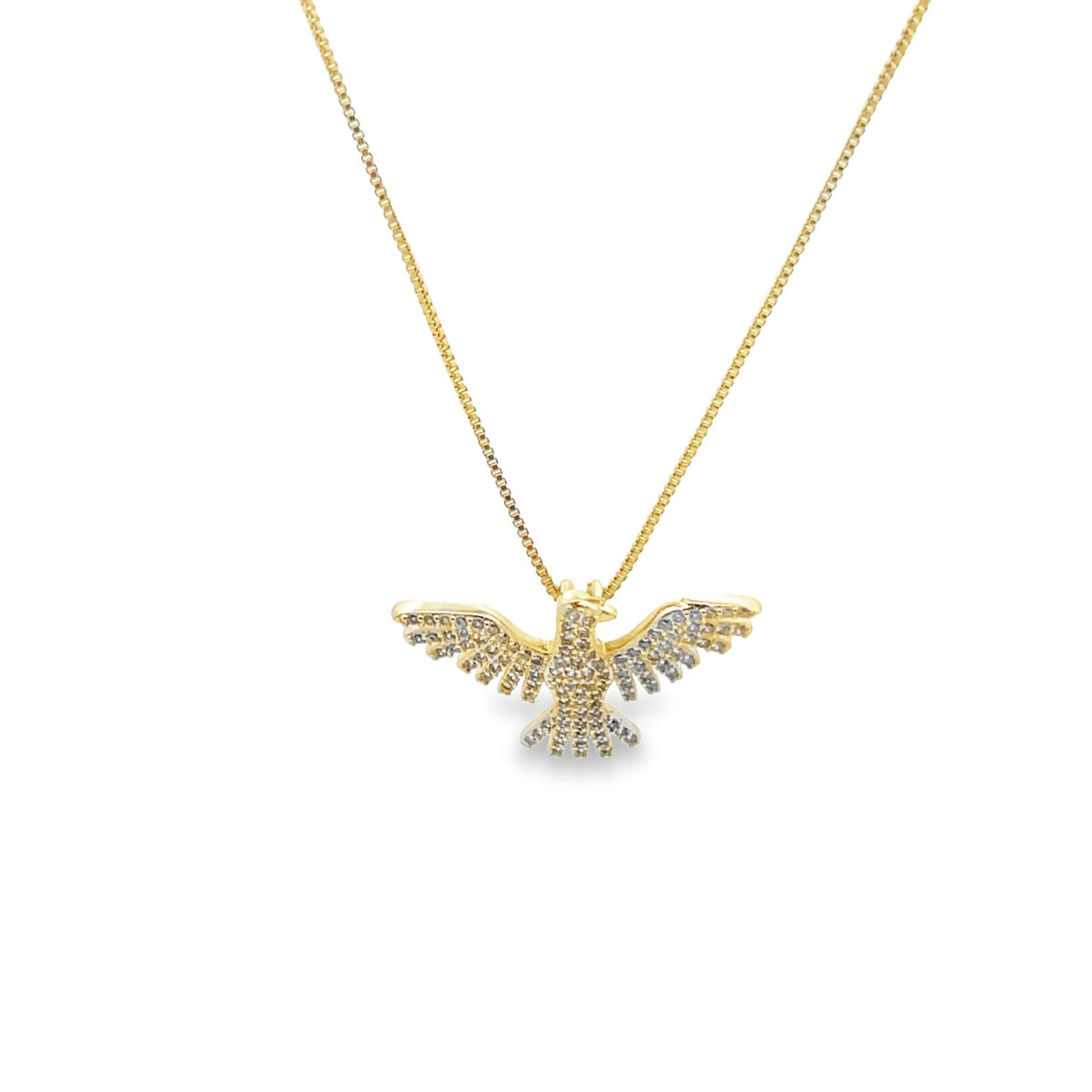 A delicate gold necklace features a sparkling pave diamond eagle pendant with outstretched wings.