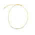 A delicate gold chain anklet featuring evenly spaced metallic bar beads lies flat on a white background.
