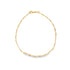 A delicate gold Figaro chain anklet rests in a circle against a white background, featuring a secure lobster claw clasp at the top.