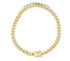 A thick gold Cuban link chain necklace lies arranged in a circle against a white background.