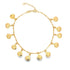 A delicate gold chain anklet dangles multiple textured teardrop charms against a clean white background.