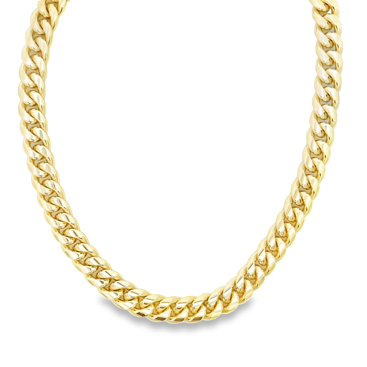 A thick, polished gold cuban link chain rests against a clean white background.