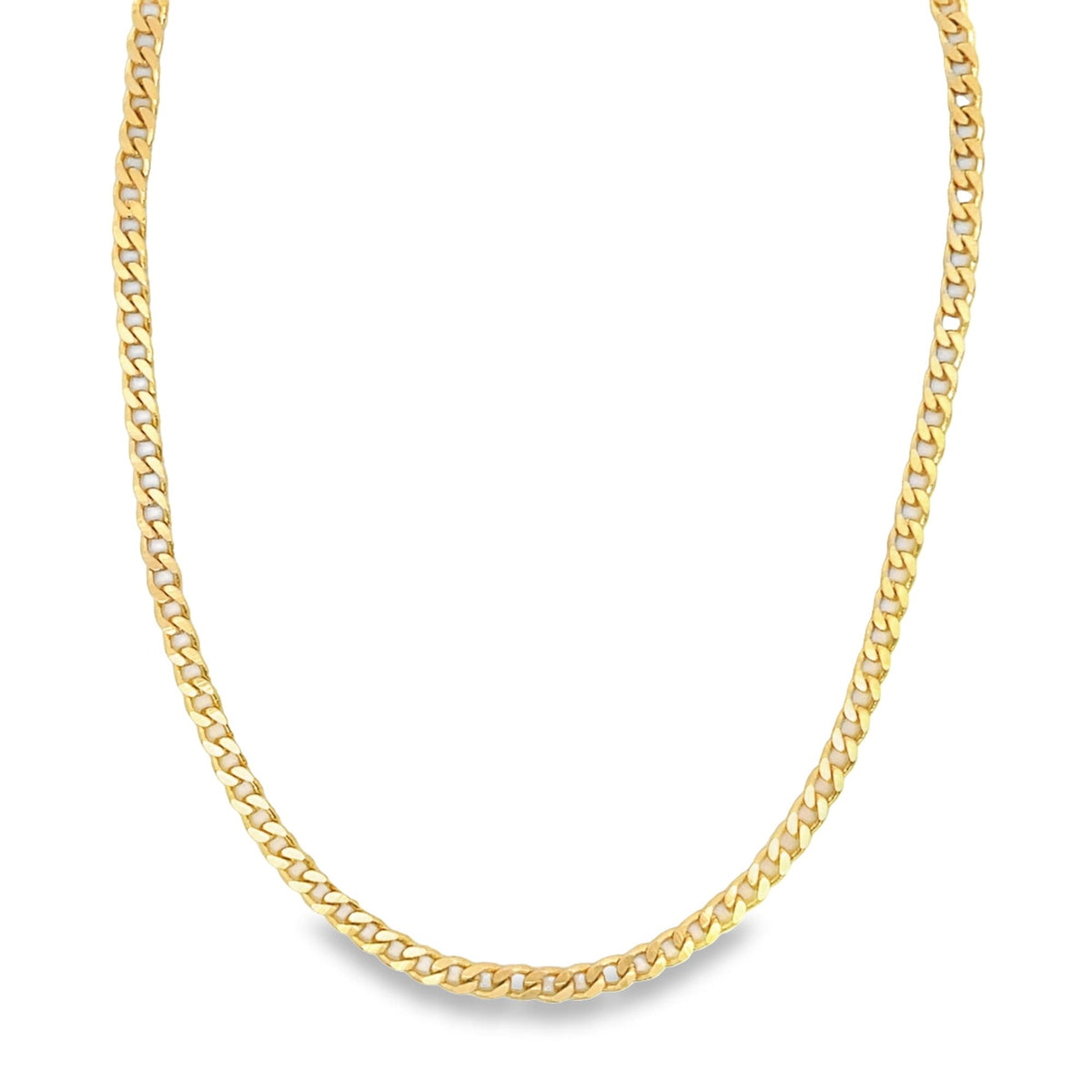 A sleek yellow gold cuban link chain necklace curves gracefully against a plain white background.