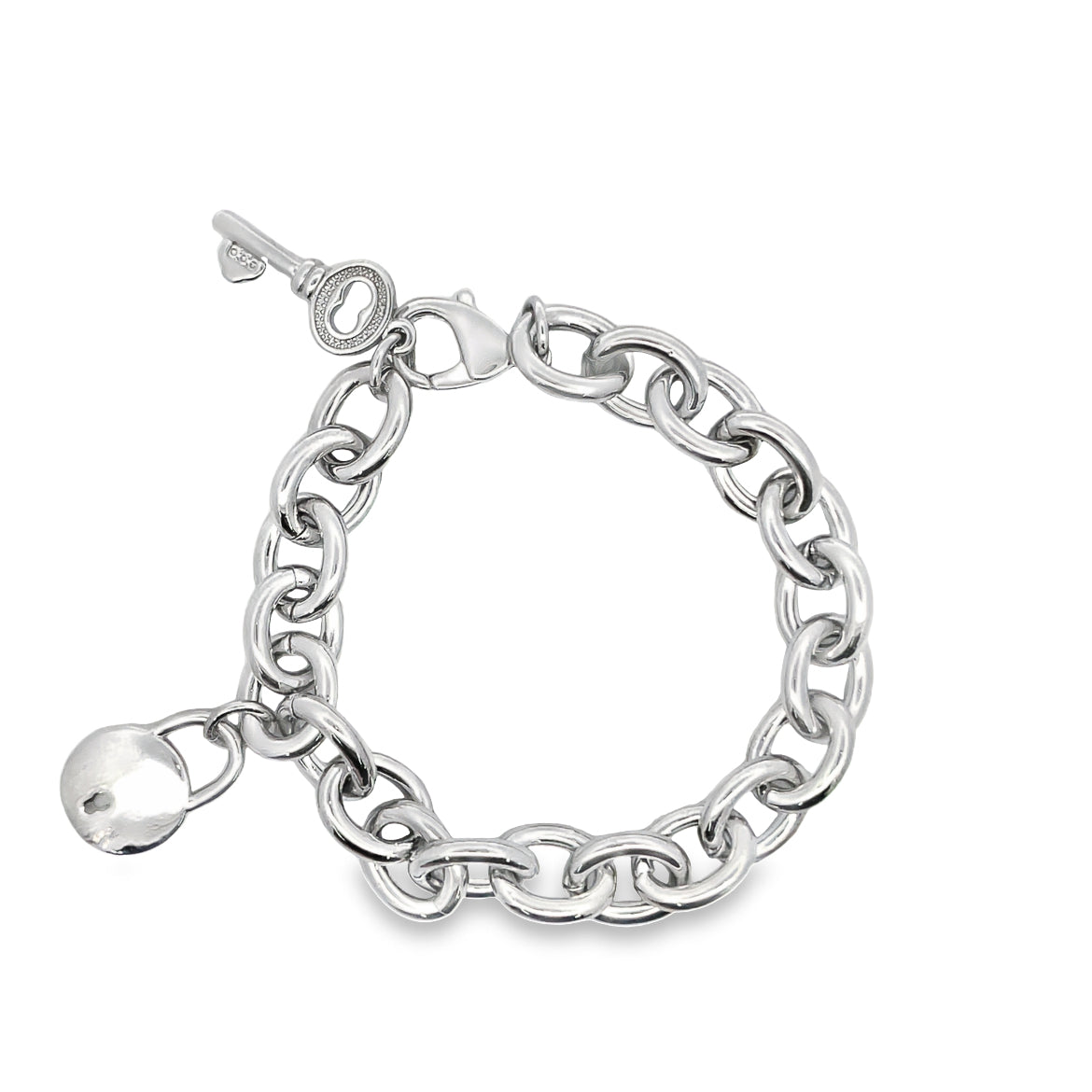 A chunky silver link charm bracelet features a dangling padlock and key pendant against a clean white background.