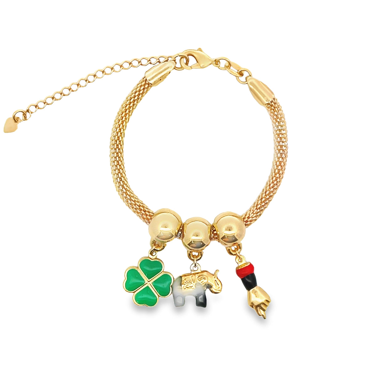 A gold-plated mesh charm bracelet displays three colorful lucky charms featuring a green four-leaf clover, a white and black elephant, and a traditional fist amulet.