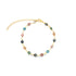 A gold-plated evil eye bracelet features vibrant multi-colored glass beads along a delicate chain.