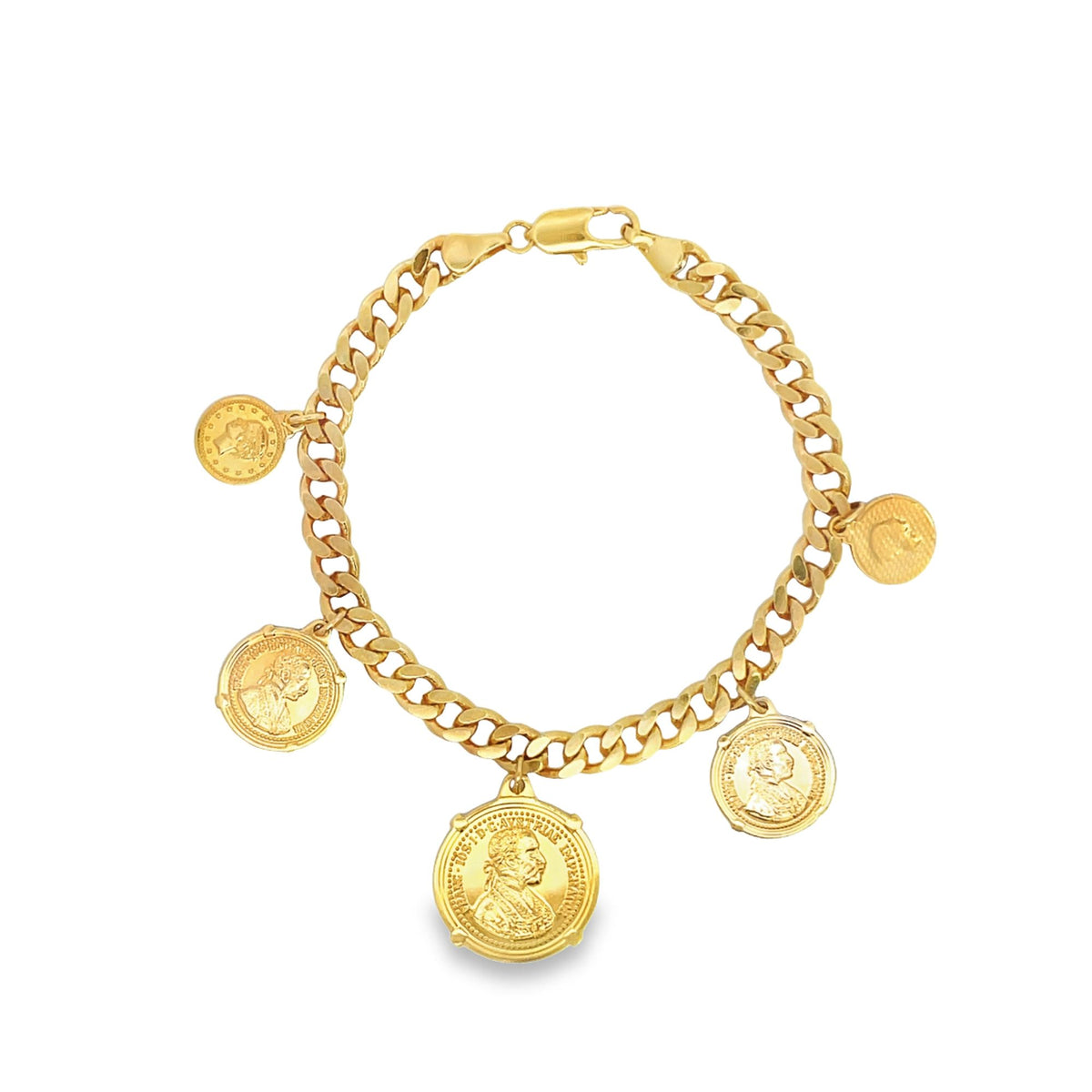 A gold curb chain charm bracelet displays dangling coin charms featuring detailed portraits.